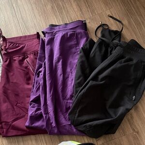 Set of Three scrubs in Black, purple and Burgundy